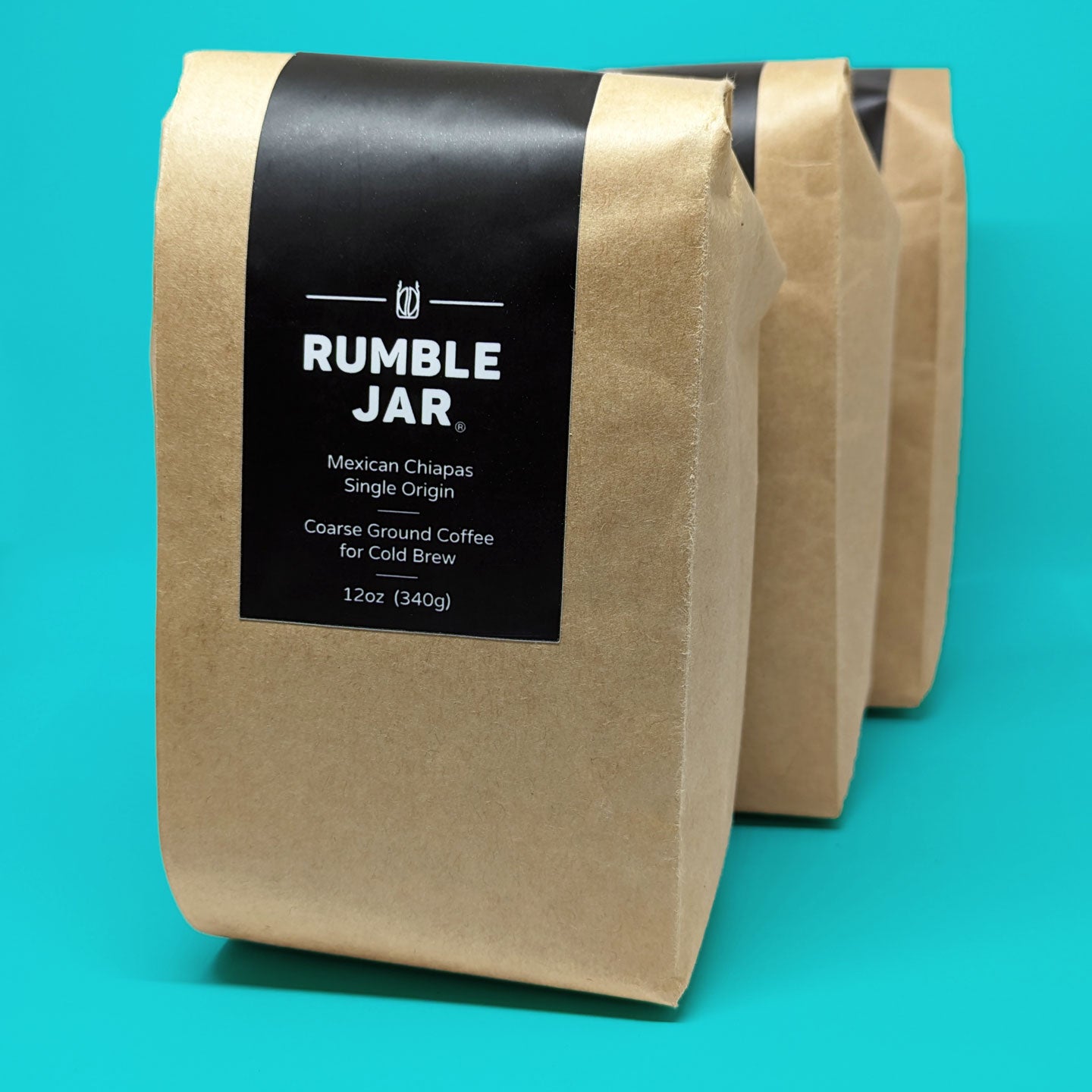 3 bags of Rumble Jar coarse ground coffee for cold brew - blue background