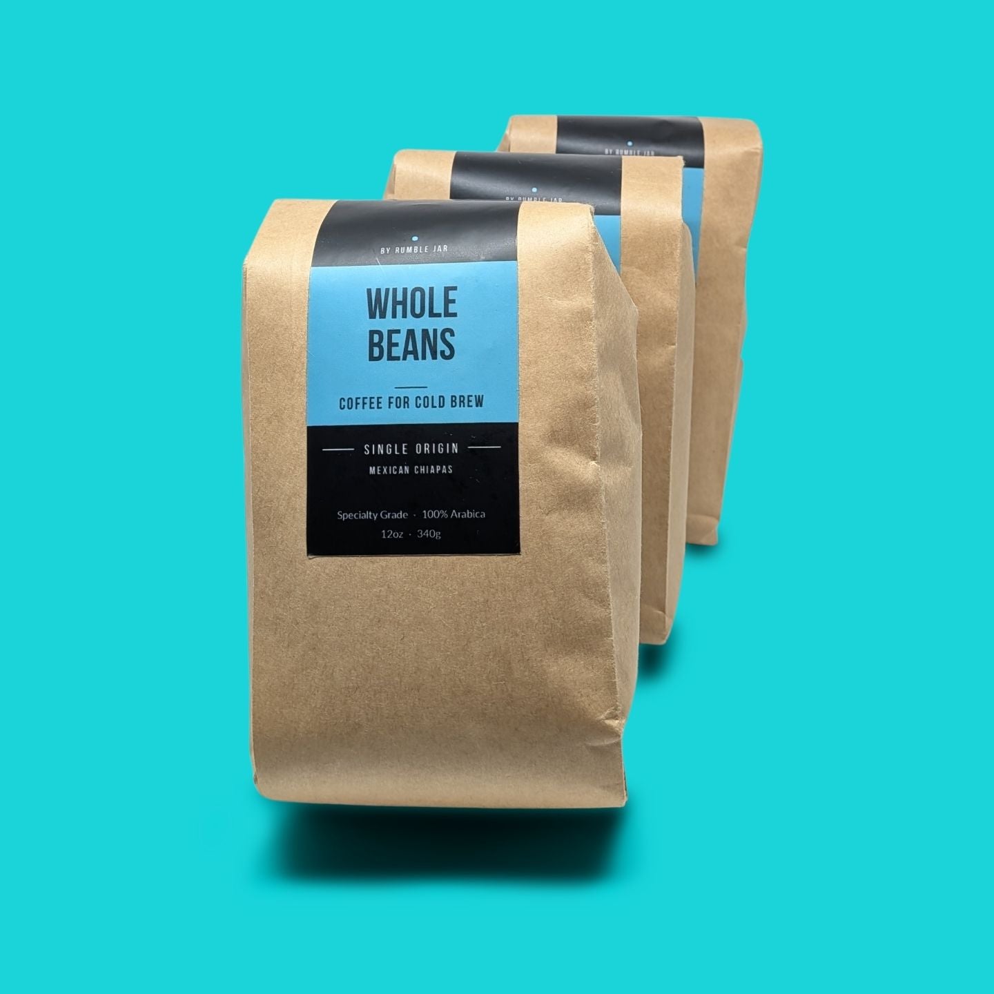 3 bags of Rumble Jar whole bean coffee for cold brew - blue background