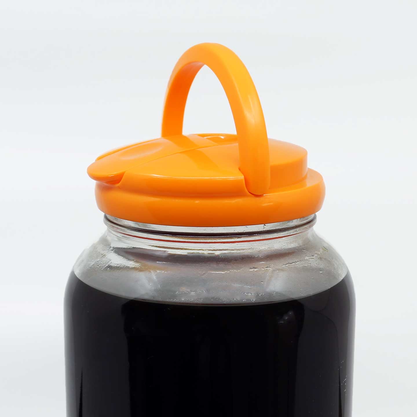 Gallon Flip-Up Pour Lid with Cap Closed and Handle Raised