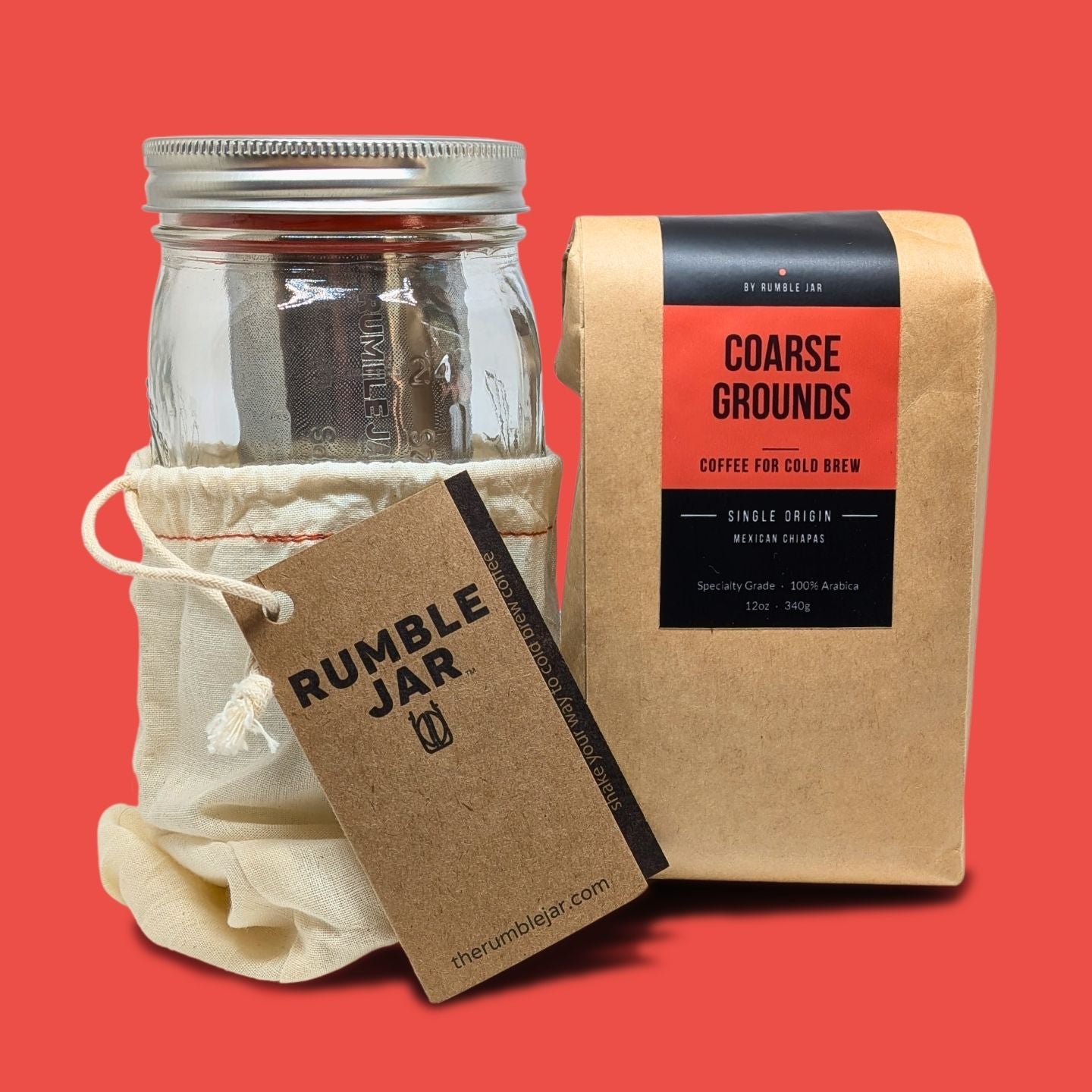 Rumble Jar 32oz brewing kit with bag of coarse grounds - peach background