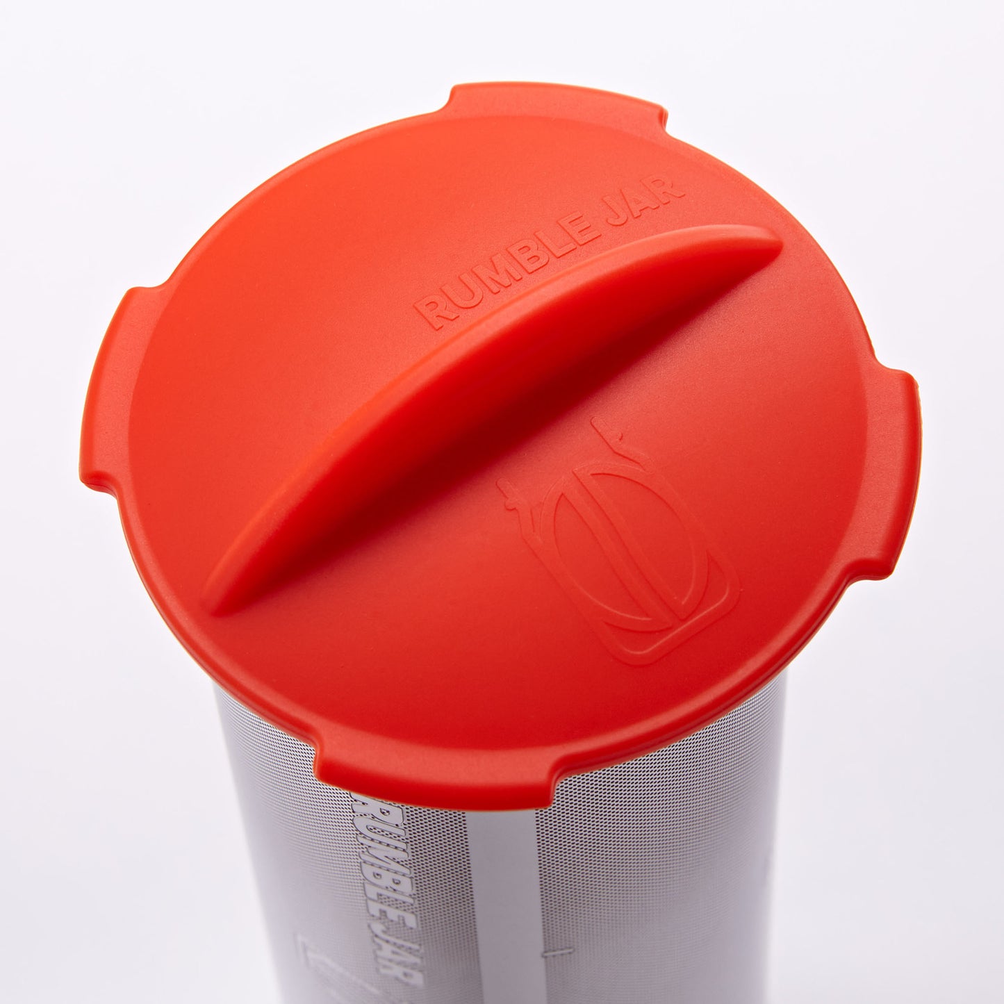 Rumble Jar's silicone cap in the orangey-red color